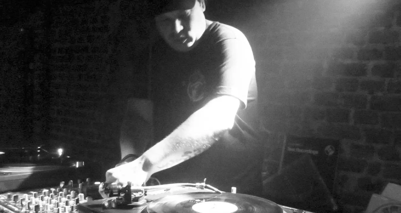 cYpher at the turntables, in black and white